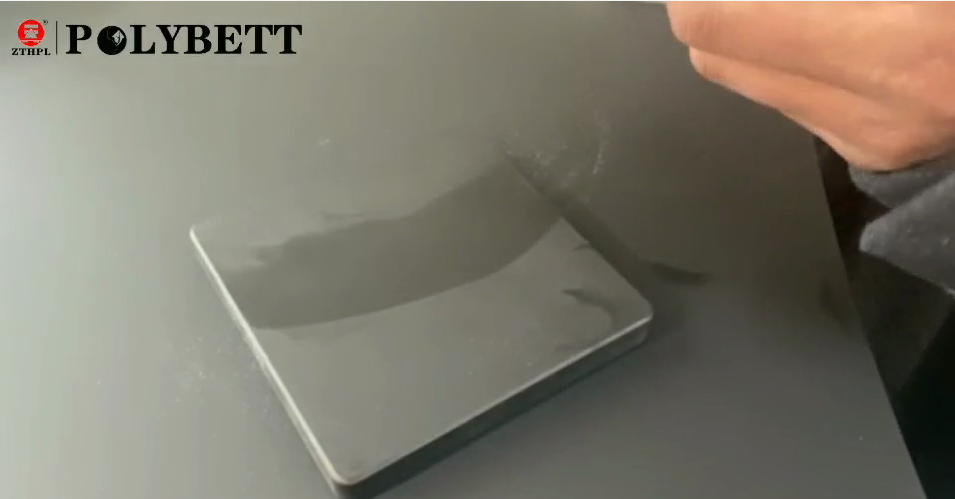 Anti fingerprint compact laminate